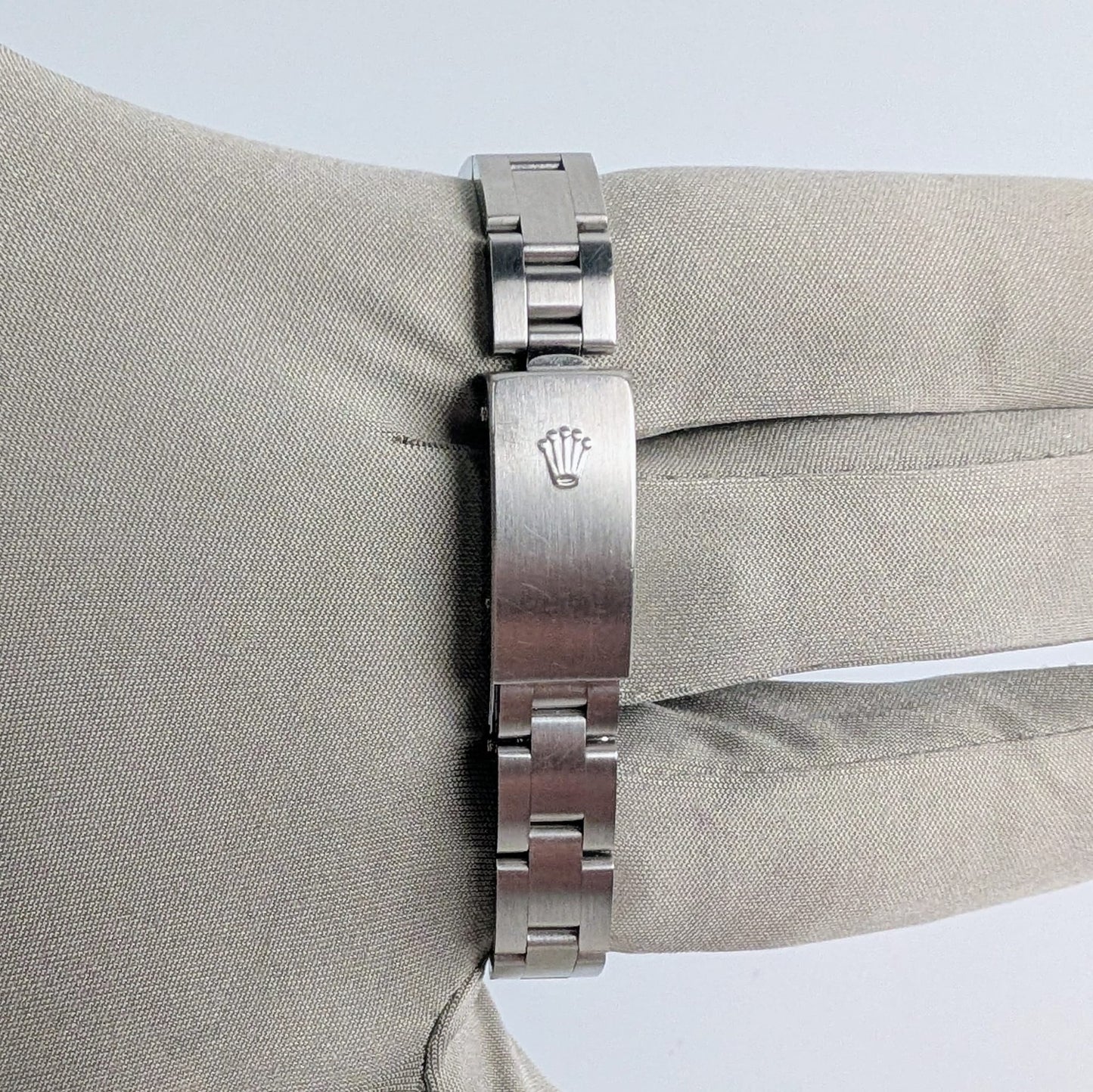 Rolex Ladies Oyster Perpetual 25mm – Silver Dial, Diamond Bezel, Ref. 76080