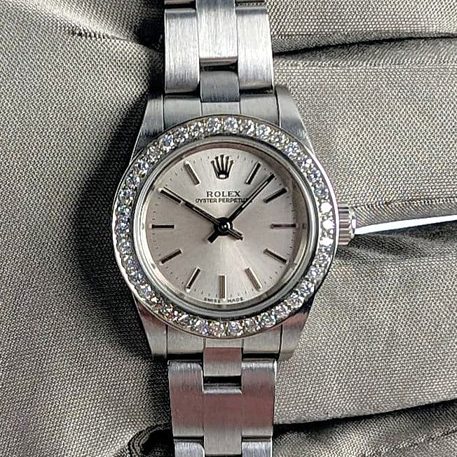 Rolex Ladies Oyster Perpetual 25mm – Silver Dial, Diamond Bezel, Ref. 76080