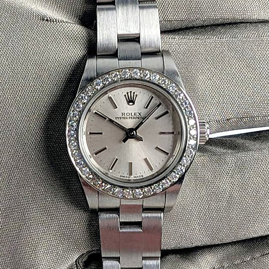 Rolex Ladies Oyster Perpetual 25mm – Silver Dial, Diamond Bezel, Ref. 76080