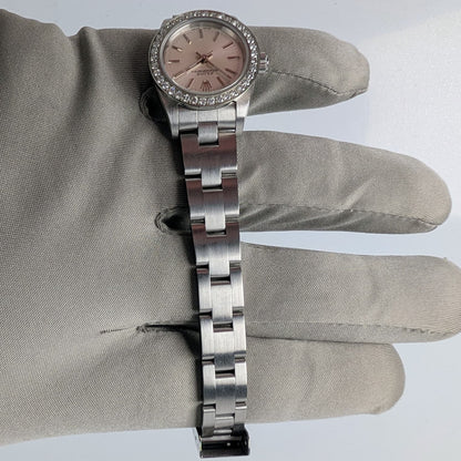 Rolex Ladies Oyster Perpetual 25mm – Silver Dial, Diamond Bezel, Ref. 76080