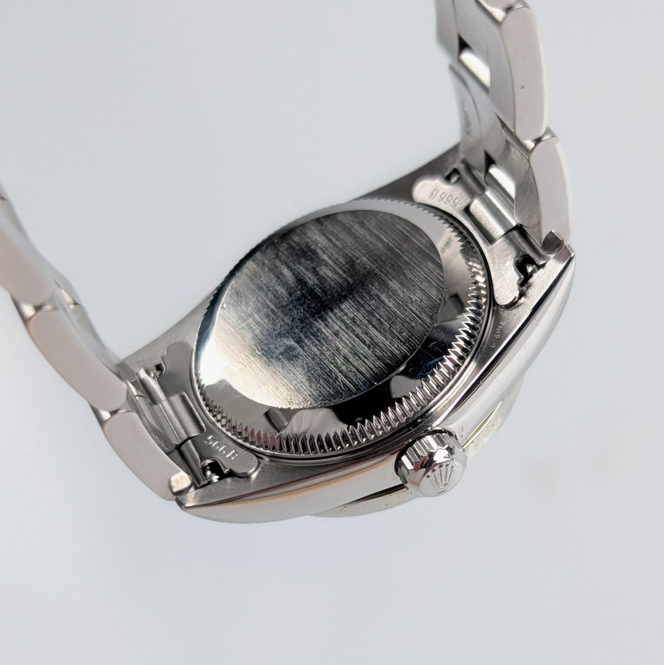 Rolex Ladies Oyster Perpetual 25mm – Silver Dial, Diamond Bezel, Ref. 76080