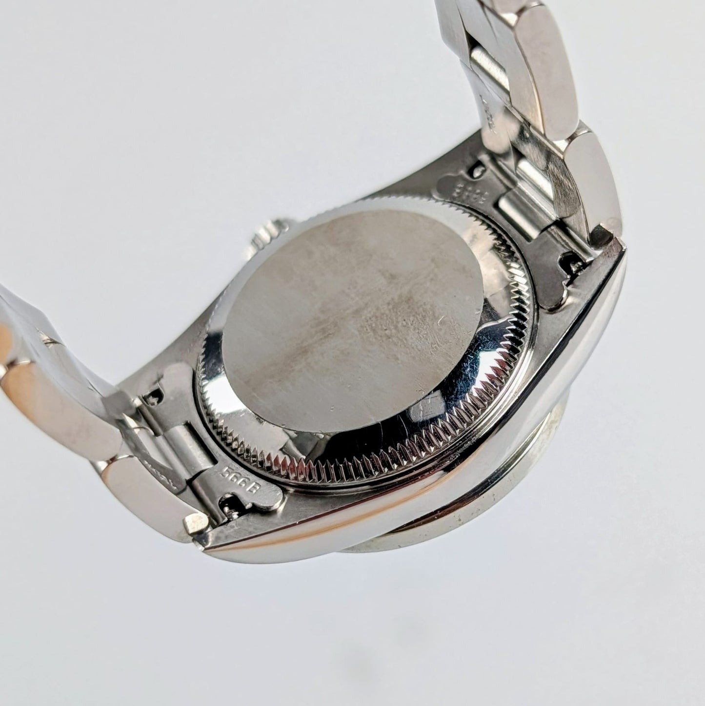 Rolex Ladies Oyster Perpetual 25mm – Silver Dial, Diamond Bezel, Ref. 76080